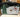 Painted Snowman on Suitcase