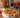 Rustic Heirloom Tomato Galette made with Tuscan Herb Olive Oil, Sun Dried Tomato Balsamic, and Black Garlic Infused Sea Salt.