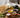 Display of bread with olive oils, balsamics and seasings to make a restaurant style bread dipping recipe