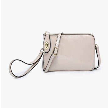 Light Grey High Gloss Wristlet with additional adjustable crossbody strap.