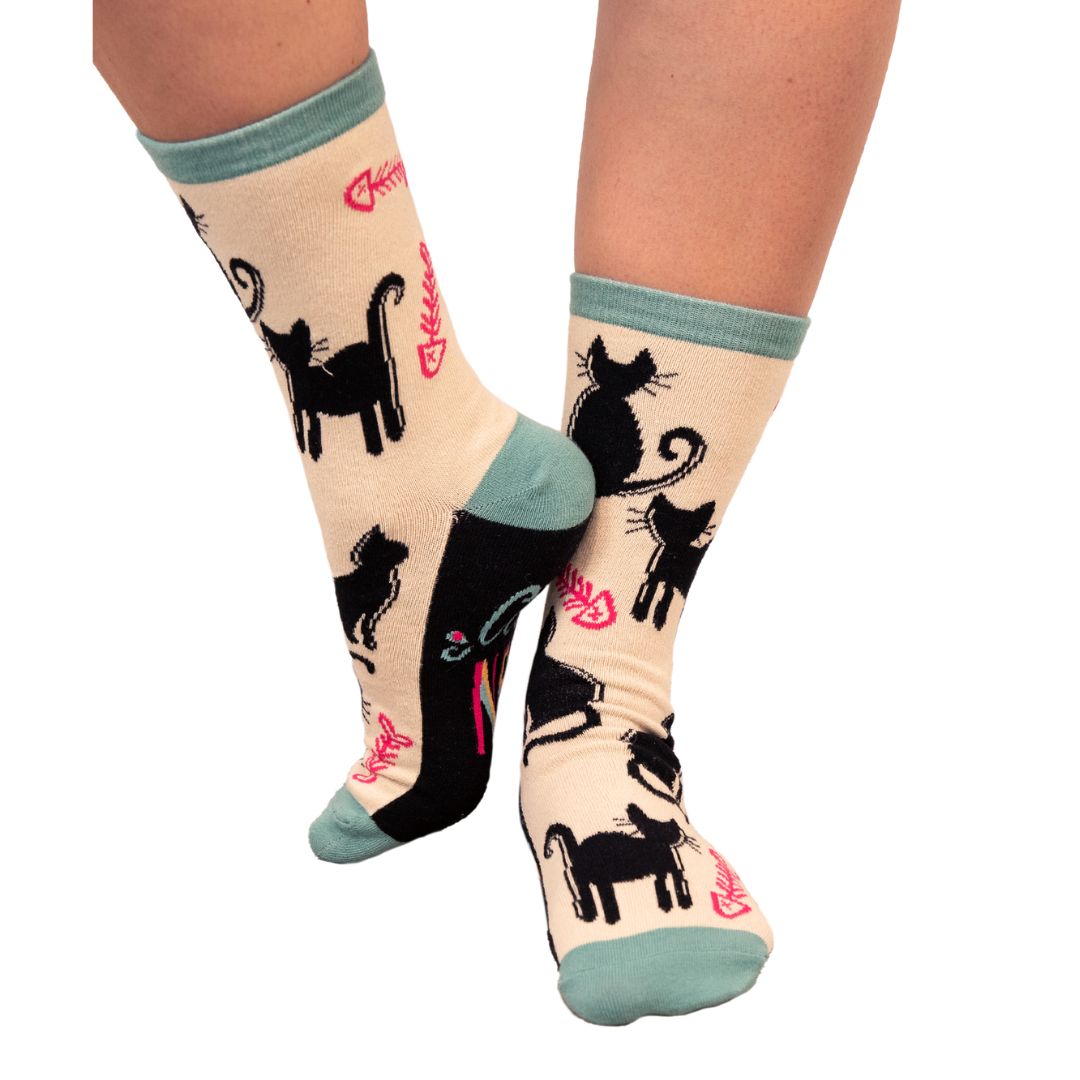 Cat Nap Crew Sock in creme brulee and mineral blue with all-over cat print and contrasting heel and toe.