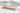 Footed marble serving board with natural veining for charcuterie and decor