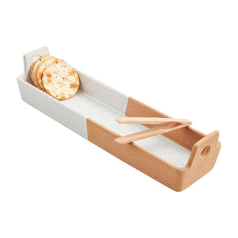 Whit and Rust Rectangular stoneware snack tray with crackers and wooden tongs on a white background