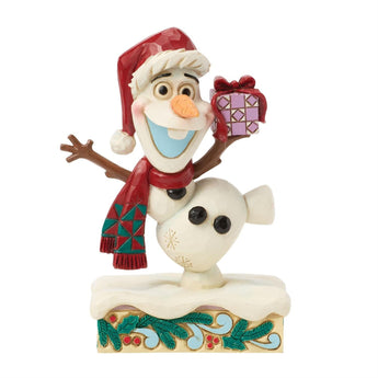Jim Shore Disney Traditions "Festive Frost" Olaf figurine wearing Santa hat and scarf, holding a colorful present with details folk-art design.
