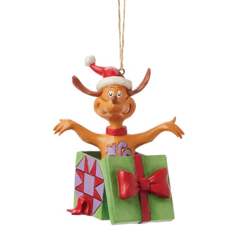 Jim Shore Grinch Max Ornament popping out of green present with red bow.