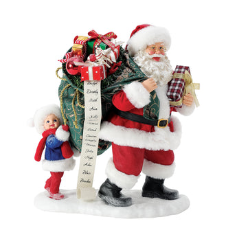 Possible Dreams Sharing the Load Santa figurine featuring Santa and a North Pole helper carrying a large sack of gifts with a flowing Nice List and Clothtique fabric details.