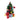 Decorative Christmas tree with lights, ornaments, and a character figure on a white background