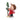 Decorative figurine of Charlie Brown in a red coat and brown hat with a small tree and gift box on a white background