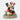 Statue of Mickey and Minnie Mouse sitting on a bench with flowers, on a white background