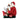 Decorative figurine of Santa Claus reading a list to a elf with a gift and Christmas tree in the background.