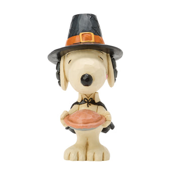 Jim Shore Peanuts Snoopy with Pumpkin Pie Mini figurine featuring Snoopy holding a freshly baked pumpkin pie with hand-painted folk-art details and autumn colors.