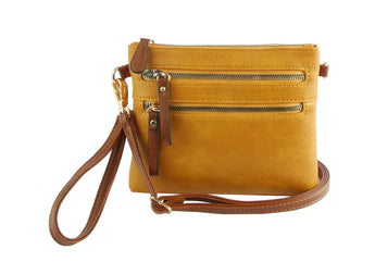 Yellow crossbody bag with brown strap on a white background