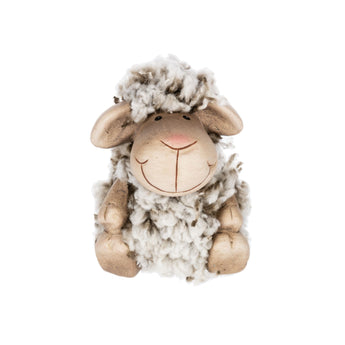 fluffy sheep figurine with a white and brown fleece on a white background