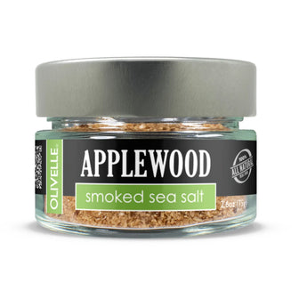 Glass jar of Applewood Smoked Sea Salt - natural wood-smoked salt for BBQ-style flavor on meats, vegetables, and snacks.