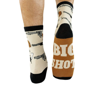 Big Shot Crew Sock with all-over pistols pattern and 'Big Shot' text on the bottom in Oxford Tan, Black, and Cinnamon Stick Brown.