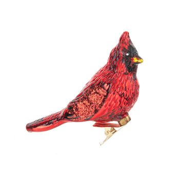 Red cardinal bird clip ornament on a white background
