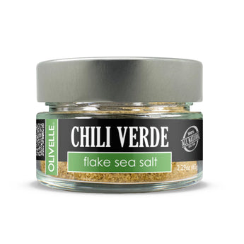Jar of Chili Verde Flake Sea Salt - spicy infused seasoning with hatch chile, poblano, and jalapeno for tacos, meats, and veggies.