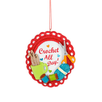Crochet All Day ornament with yarn, crochet hooks, and scissors