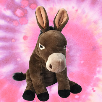 Cuddlekins Mule stuffed animal with soft brown fur and long ears on pink tye die background