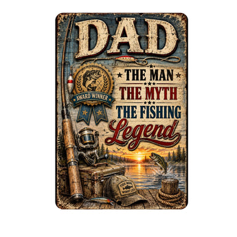 A rectangular decorative sign with a rustic weathered wood design featuring the word “DAD” at the top, fishing-themed graphics including a rod, lure, diving helmet, hat, rope, and a fish jumping from water at sunset, plus the phrases “THE MAN THE MYTH THE FISHING Legend” and an “AWARD WINNER” badge.
