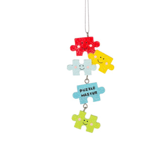 Colorful puzzle piece-shaped charms hanging ornament on a white background