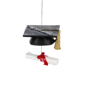 Black graduation cap and diploma ornament on a white background