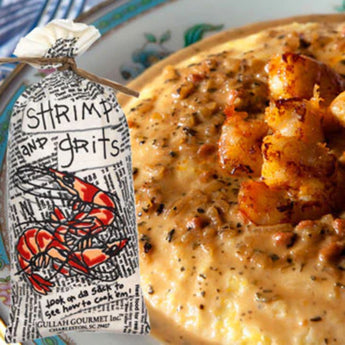 Shrimp and grits dish with a Gullah Gourmet Inc. packaging in the foreground.