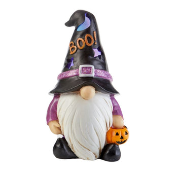 Halloween gnome witch with black "boo" hat carrying a trick or treat pumpkin figurine