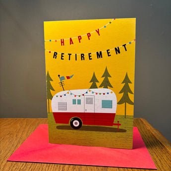 Retirement card with camper illustration on a yellow background