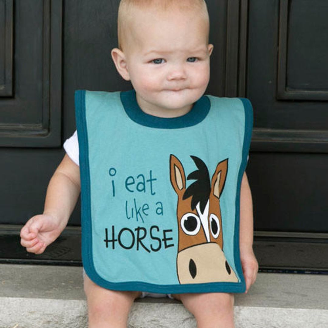 Infant bib in Mineral Blue with 'I Eat Like a Horse' print, large size 11”x 15” for full coverage, made from 100% combed cotton, easy to pull on and off