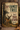Rustic whitetail deer hunting tin sign displayed with cabin decor