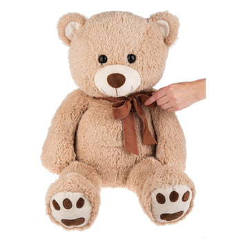 30" Plush teddy bear with a brown bow held by a hand on a white background