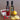 Berry Bright Better Together Gift Set with Sicilian Lemon Infused Olive Oil and Vine-Ripened Raspberry White Barrel Aged Balsamic with fruit on table top.