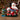 Decorative Christmas scene with Santa Claus reading 'the night before Christimas' to a little boy and girl.