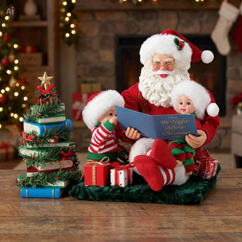 Decorative Christmas scene with Santa Claus reading 'the night before Christimas' to a little boy and girl.