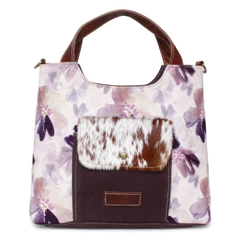 Sixtease Handbag with floral pattern and cowhide leather pocket on a white background