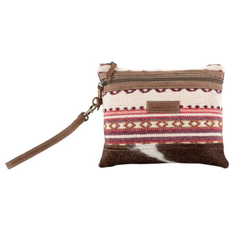 Sixtease Orchid wristlet made with rug canvas hairon hide and leather with wrist strap