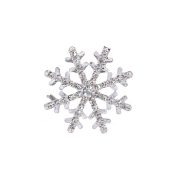 Silver snowflake ornament with rhinestones on a white background