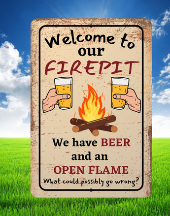 Funny Camping sign that reads "Welcome to our firepit. We have beer and an open flame. What could possibly go wrong?" on rustic metal background