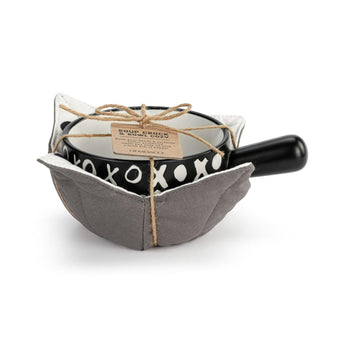 Black stoneware XO soup crock with cotton bowl cozy and handle, tied with rustic twine.