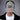 Person wearing a cap with 'WILL DANCE FOR BEER' text and graphic on a gray background