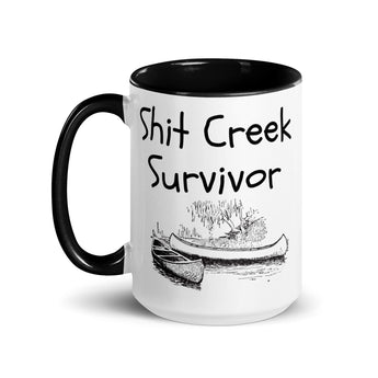 Shit Creek Survivor 15 oz ceramic coffee mug with black handle and interior featuring a bold sarcastic design