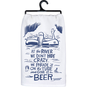 Cotton Kitchen Towel with 'At the river we don't hide crazy...we parade it on the tube and give it a beer' design. Perfect towel of cabin or house along the river.