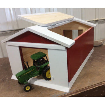 Large handcrafted wooden toy machine shed with sliding doors and hinged roof