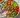 Healthy turkey bowl with sweet potatoes, avocado, quinoa, fresh vegetables, and balsamic dressing