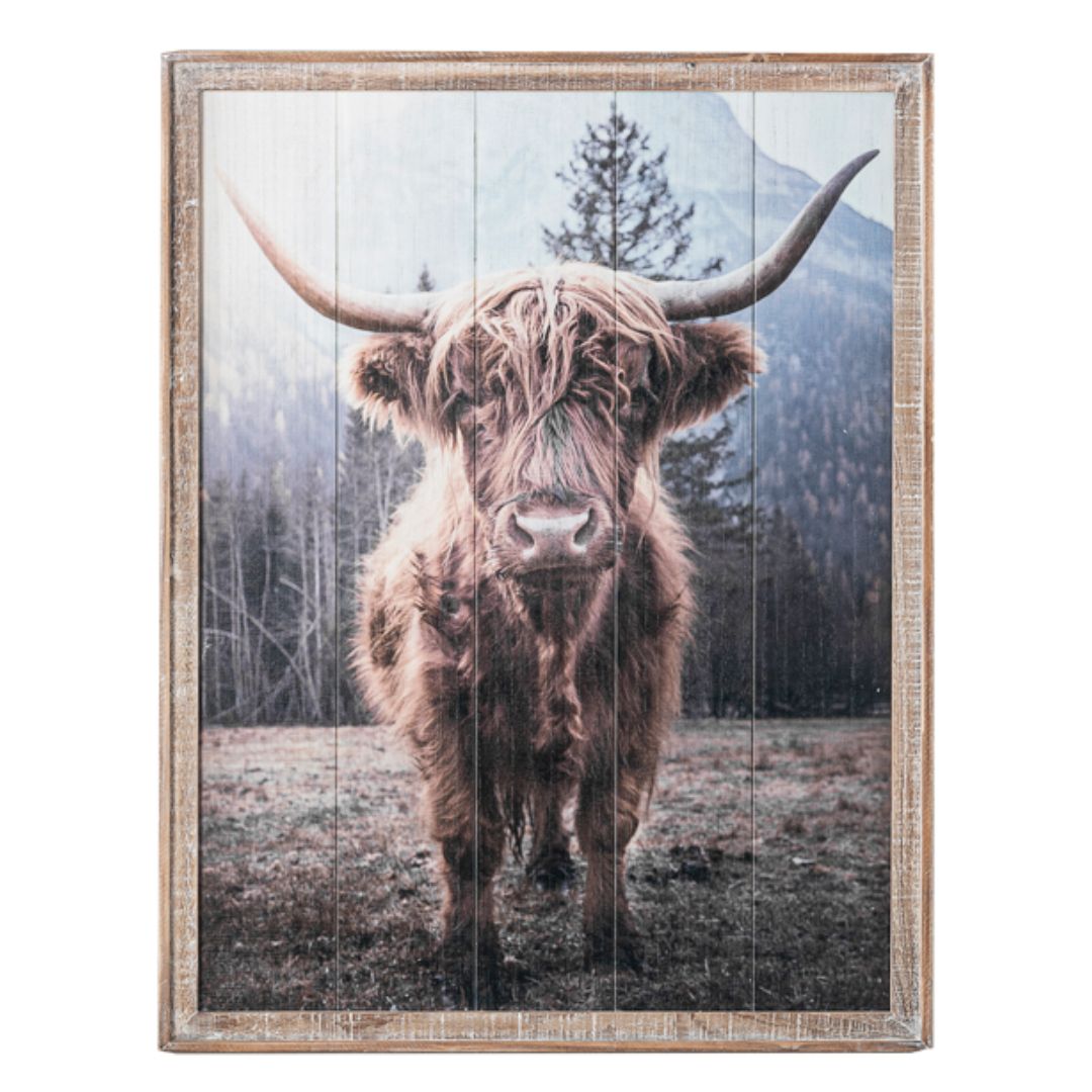 Artistic depiction of a Highlander cow in front of mountains, encased in a 28x36 inch barnwood frame, ideal for adding a rustic touch to any decor.