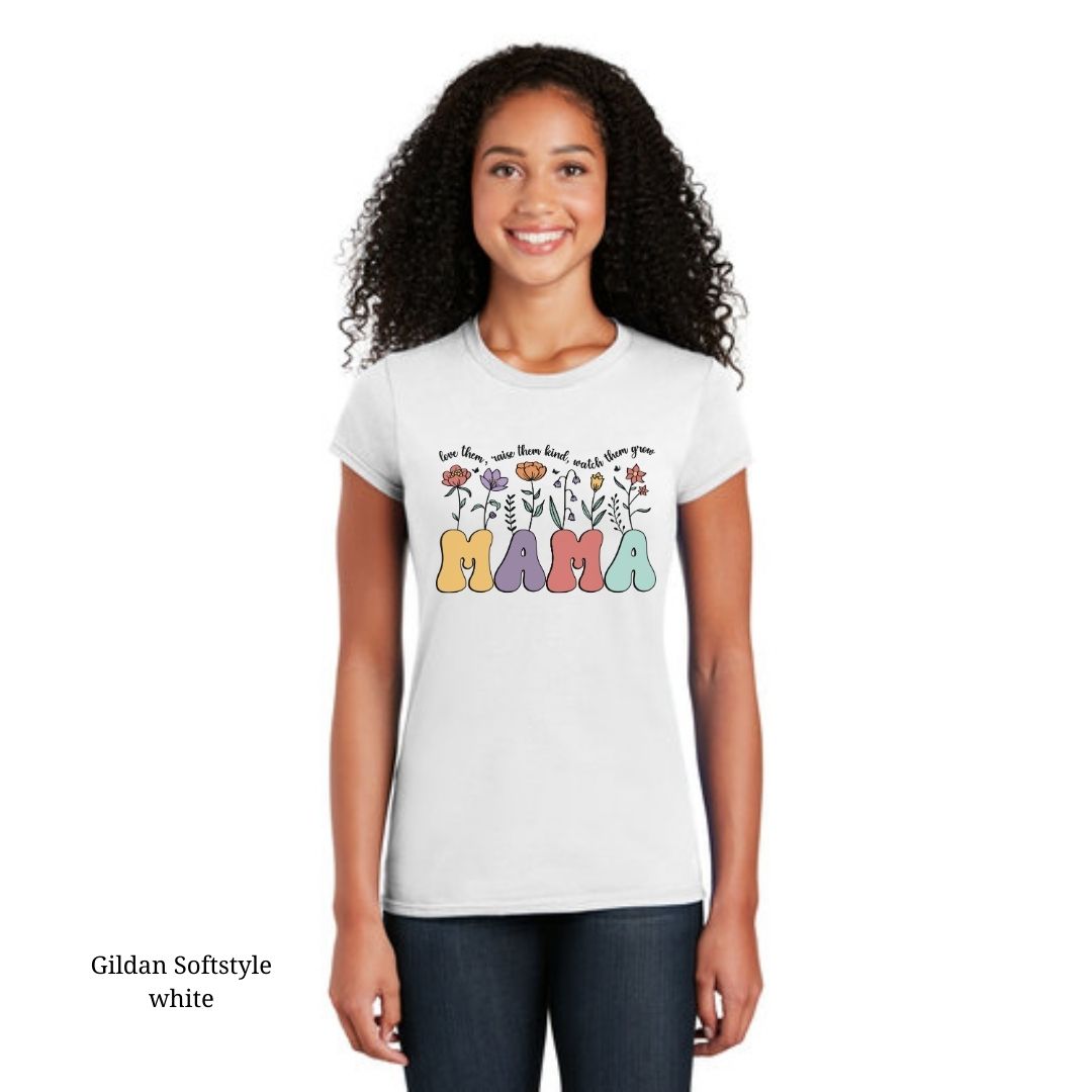 White Cotton Tee with Mama Wildflower Retro design with the quote 'Love them, raise them kind, watch them grow', available in sizes Small to 3XL.