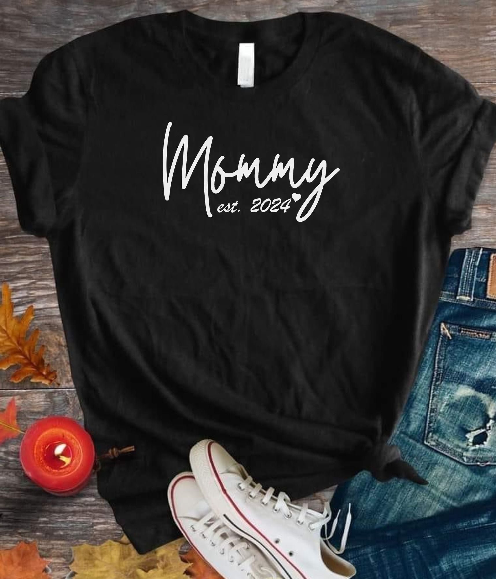 New Mommy T-shirt just in time for Mother's day. Great gift for the new mom. T-shirt reads "Mommy, est. 2024" with a little heart.