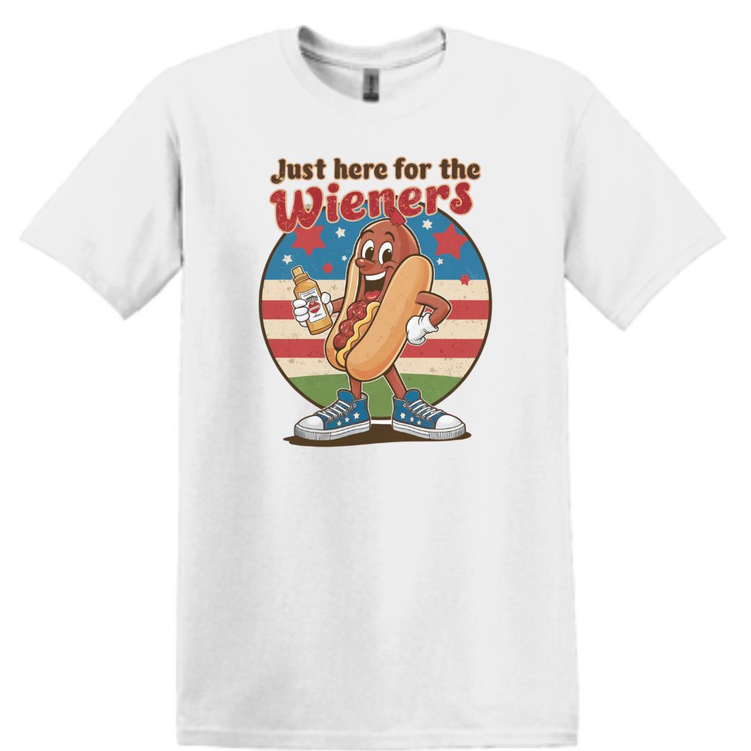 Just Here for the Wieners Retro Americana White Cotton Tshirt for the 4th of July featuring a cartoon hotdog holding a bottle of mustard with a red,white and blue background.