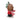 Decorative figurine of a charlie brown wearing a red coat and scarf, holding a bundle of sticks on a white background